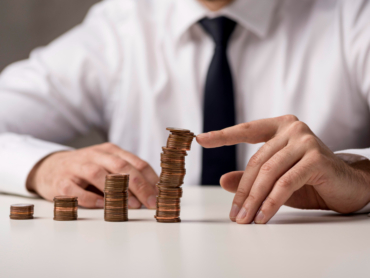 front-view-businessman-suit-tie-with-coins